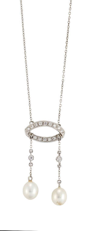 
	
		A diamond and pearl drop pendant necklace, each pearl suspended from the elliptical...