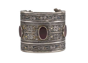 
	
		A silver and gold Yomud tribal cuff set with carnelians, Turkmenistan, 19th/20th century,...