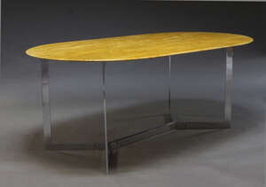 
	
		A marble top dining table, c.1970s, the rounded yellow marble top on chromed supports,...