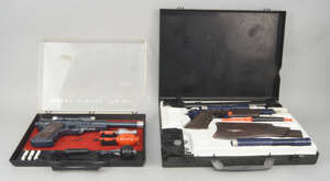 
	
		A Topper Secret Sam Suitcase Gun and Camera, the black plastic attaché case with rifle,...