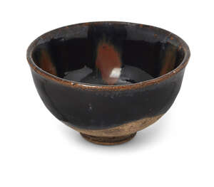 
	
		A Chinese Cizhou-type stoneware tea bowl, Northern Song dynasty, delicately potted with...