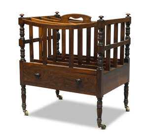 
	
		An early Victorian rosewood canterbury, with four divisions, pierced handle and turned...