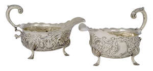 
	
		A pair of George II silver sauce boats, London, c.1748, Ann Kersill, each raised on three...