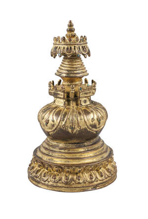 
	
		A Tibetan gilt jeweled bronze stupa, 17th/18th century, the bell form base decorated with...