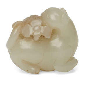 
	
		A Chinese pale green jade cat, 19th century, carved as a recumbent cat with heard turned...