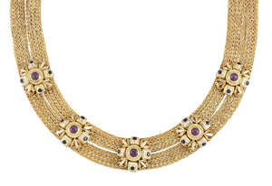 
	
		A ruby and sapphire-set necklace by Lalalounis, of twin row mesh design set to the front...