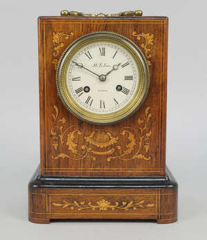 
	
		A French rosewood and inlaid mantel clock , late 19th century, the rectangular case with...
