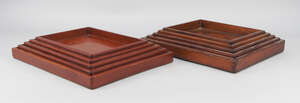 
	
		A set of five Japanese red lacquer stacking trays, 20th century, the largest 39.5 x...