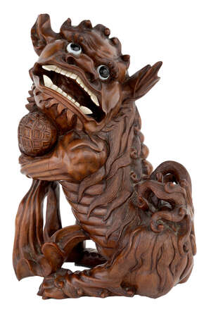 
	
		A Chinese wood lion dog, 20th century, carved sitting on its hind legs with mouth open,...