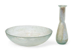 
	
		A Roman pale blue shallow hemispherical glass dish with a band of medial wheel-cut...