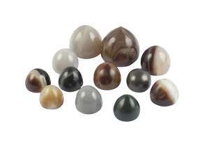 A group of hardstone gaming pieces, Roman, 2-4th century AD, of domed form, height 2-3.8cm (12)
		 
		Provenance: Private collection US  
		 
		A similar