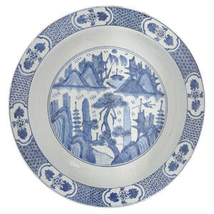 
	
		A large Chinese porcelain dish, Wanli period, painted in underglaze blue to the central...