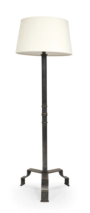 A modern burnished steel standard lamp, with lattice decoration to the mid-section, with splayed...