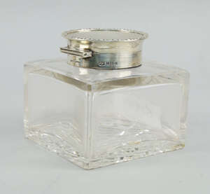
	
		A Mappin & Webb large square glass inkwell with silver collar and convex hinged cover,...