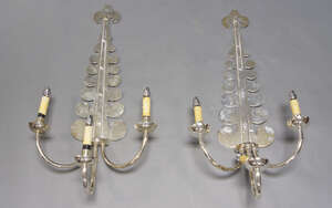 
	
		A pair of silvered metal three branch wall lights, late 20th century, with scrolling...