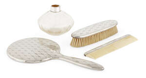 
	
		A Swiss silver mounted hand mirror, comb and clothes brush, decorated with engraved...