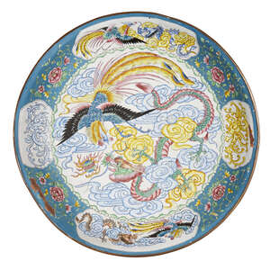 
	
		A Chinese Canton enamel dish, 19th century, painted with a dragon and phoenix amidst...