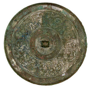 
	
		A Chinese bronze circular mirror, Warring States period, flat cast with intertwined...