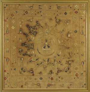 
	
		An Indian embroidered panel, 19th century, with a central multi-armed goddess holding...