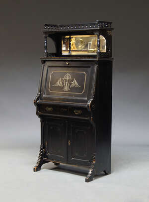 
	
		An ebonised Aesthetic Movement cabinet, the top with three quarter gallery, above...