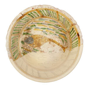 
	
		A very large Byzantine fragmentary pottery bowl, 6th-7th century, decorated to the...