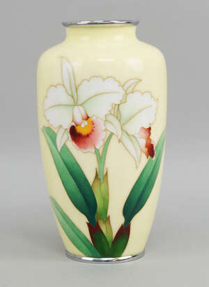 
	
		A Japanese yellow enamel vase, late 20th century, decorated with orchids and leaves,...