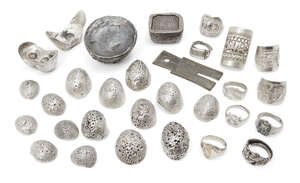 
	
		A collection of Chinese silver rings and white metal ingots, 20th century, (29)

	


