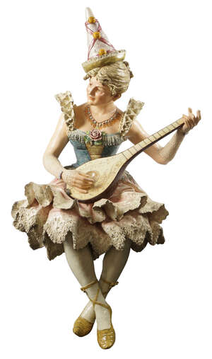 
	
		A large Austrian pottery figure of a girl, late 19th century, modelled seated playing a...