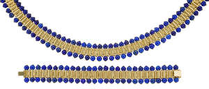 
	
		A Lapis Lazuli necklace and bracelet, the collar necklace composed of a series of...