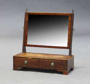 
	
		A Regency mahogany dressing table mirror, with rectangular swing frame mirror plate,...