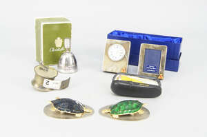 
	
		A pair of enamel, gilt and silvered metal novelty desk clips, by Asprey, each modelled as...