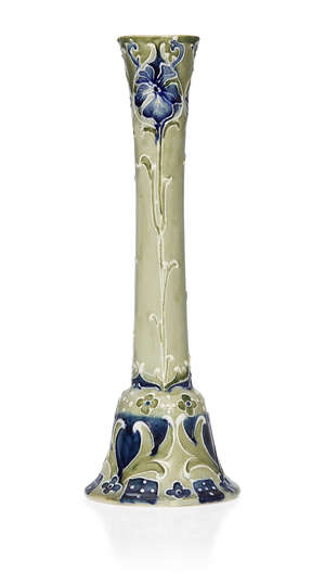 
	
		William Moorcroft (1872-1945), a Florian ware candlestick 
		c.1900, incised WM Des,...