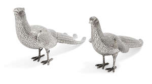
	
		A pair of Continental white metal pheasants with articulated wings, the body of each...