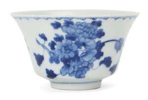 
	
		A Chinese porcelain bowl, early 19th century, painted in underglaze blue with flowering...