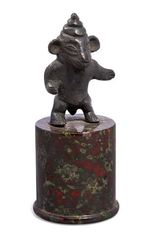 
	
		A bronze figure of Ganesha's vahana the mouse, India, 17th-18th century, on marble...