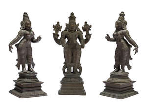A South Indian bronze triad of Vishnu with Sri Devi and Bhu Devi, Karnataka, 19th century, each on a square base, Vishnu depicted with his discus (chakra) and 