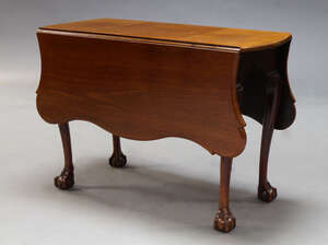 
	
		A George III style mahogany drop leaf table, incorporating some 18th Century elements,...