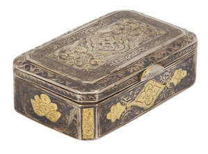 
	
		A nielloed and gilt decorated silver pill box, Iran, 19th century, of rectangular form...