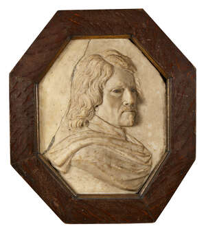 
	
		An Anglo-Flemish marble portrait relief of a gentleman, late 17th century, with painted...