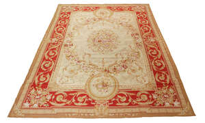 
	
		A Louis XVI style needlework carpet, late 20th century, with central floral medallion,...