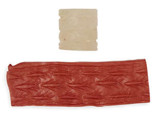 A large chalcedony cylinder seal, circa 3000 B.C., with shoal of swimming fish, 3cm. high
		
		Provenance: Acquired from a private collection, UK.  
		 