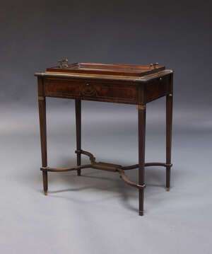 
	
		A Regency mahogany and brass inlaid tray top table, the rectangular top surmount with...