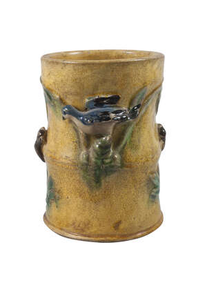 
	
		A Japanese earthenware brush pot, late 19th century, the simulated bamboo body decorated...