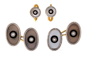 
	
		A pair of diamond cufflinks and dress studs, c. 1910, designed as oval mother-of-pearl...