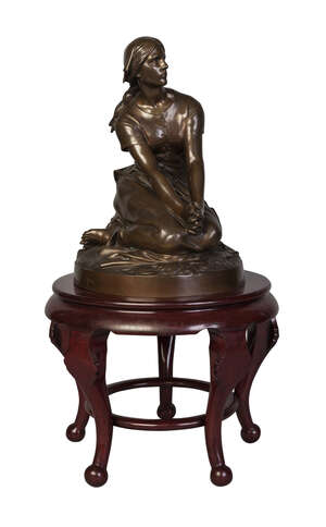 
	
		 
		A French bronze figure of Joan of Arc, 19th century, modelled seated on a circular...