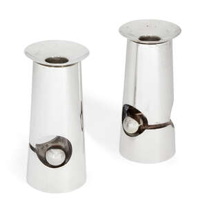 
	
		A pair of contemporary Israeli short Sabbath candlesticks, stamped 925, the cut-out...