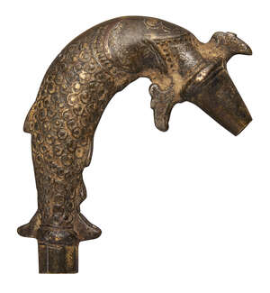 
	
		A water spout finial in the form of a fish, Deccan, India, 18th century, 11cm long

	

