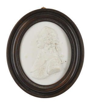 
	
		British School, a biscuit porcelain portrait relief of George II, possibly by Wedgwood,...