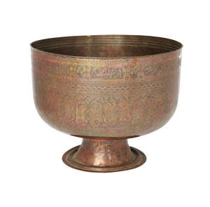 
	
		A large engraved copper footed bowl, Iran, 18th century, on spreading foot, the deep bowl...