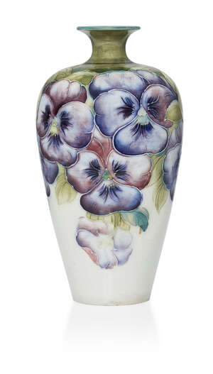 
	
		William Moorcroft (1872-1945), a Pansy pattern ceramic vase
		1911-1913, signed in green...